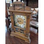 Antique oak mantle clock.