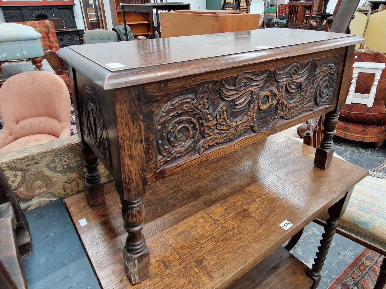 Carved oak box stool.