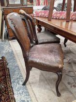 A set of six Victorian balloon back chairs.