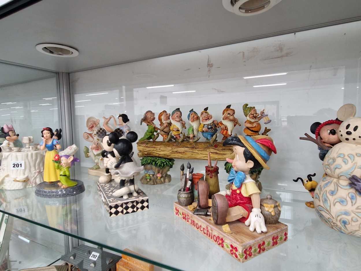 A collection of Disney cartoon figures