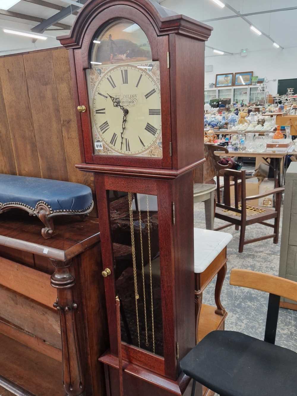 A modern long case clock.