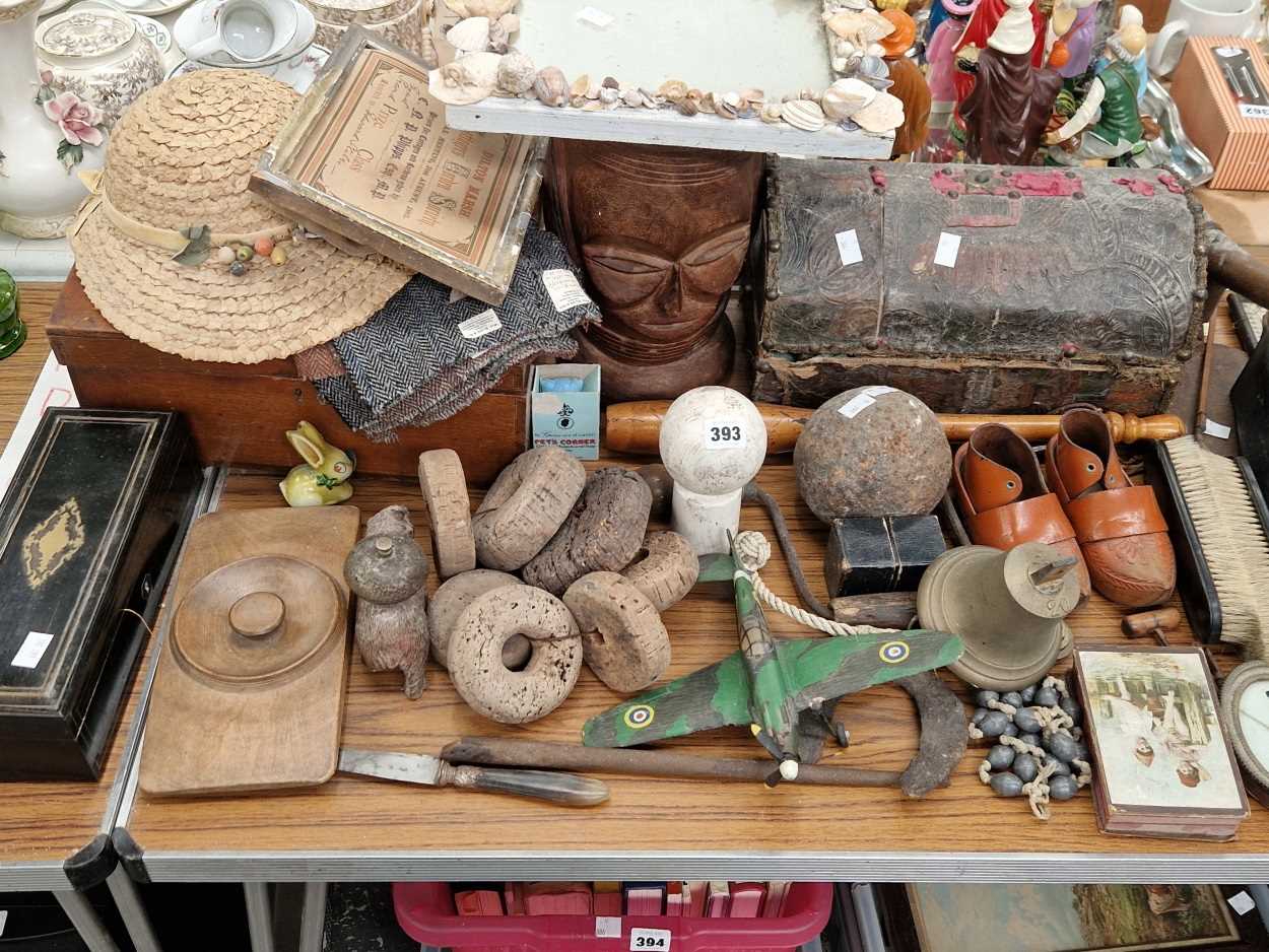 A wooden box of sewing material, cork fishing net floats, a leather mounted box, a tribal drum, a