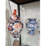 An 18th C. Imari jar and cover together with a blue and white faenza wet jug ewer