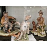 Three Capodimonte figures of characterful men with birds and with dogs