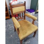 A Victorian show frame arm chair.