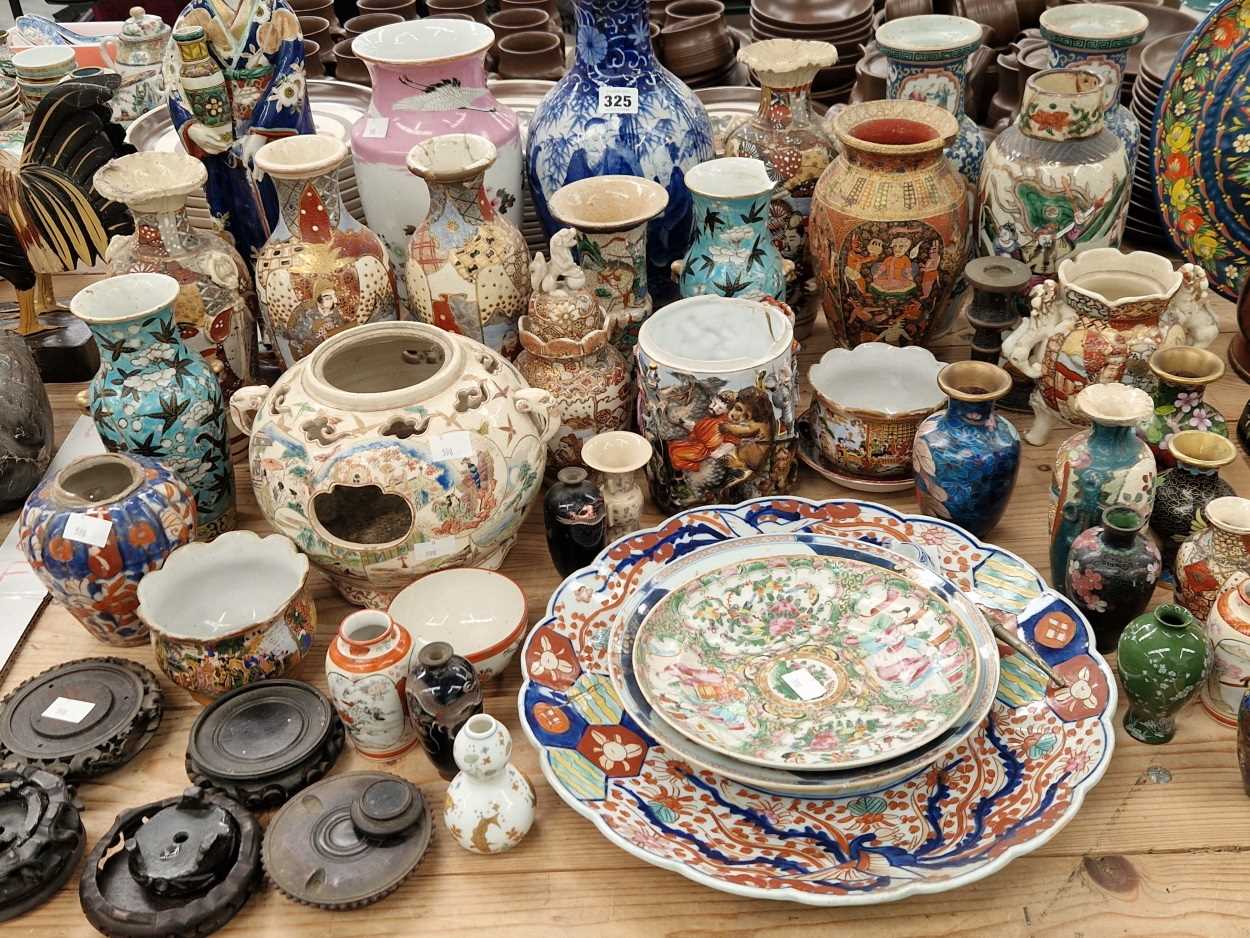 Chinese and Japanese vases, dishes and a figural lamp