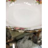 A part set of Royal Albert old rose pattern tea wares, two tureens, two vases, etc. There is a