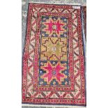 A TURKISH RUG OF CAUCASIAN DESIGN 154 x 90 cm.