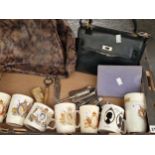 Corkscrews, coronation and similar royal mugs, two handbags and two stamp albums