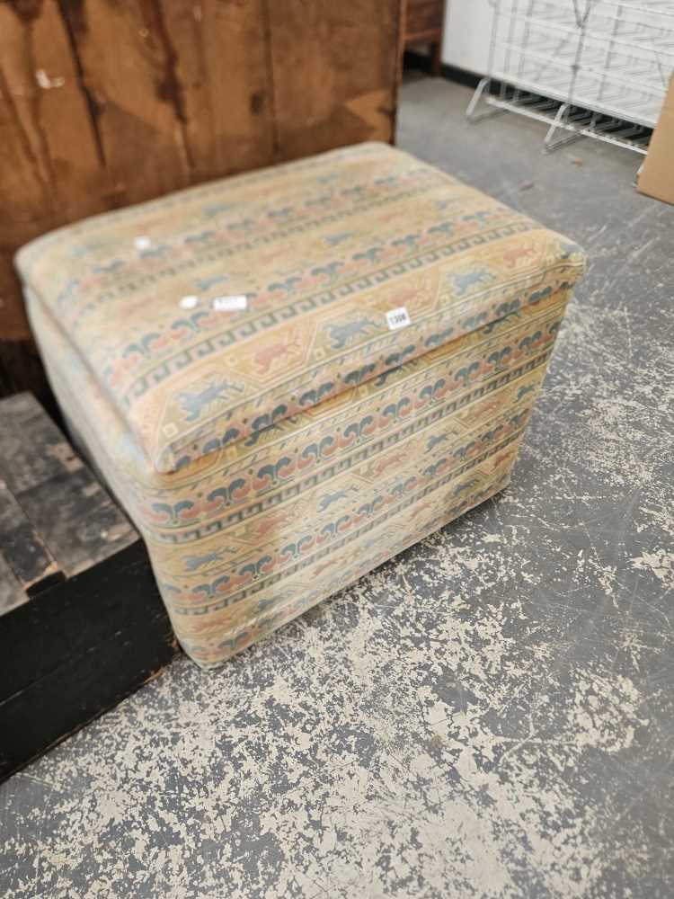 A Contemporay upholstered lift top ottoman, together with two cushions