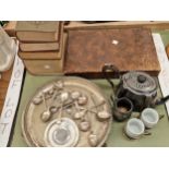 A canteen and loose electroplate cutlery, a salver, a tea pot together with four books