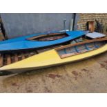 Two vintage wood Swellerton canoes