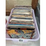 Approximately 100 7" single records mostly 70's and 80's pop and rock.