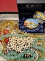 A quantity of bead necklaces, cultured pearls and other necklets, an epns case, two Halcyon Days