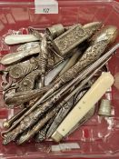 A collection of hallmarked silver mounted and other button hooks, scissors, fruit knives etc.