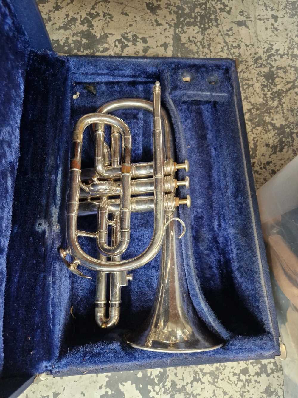 A silver plated cornet. We are able to post this to a UK address. The cost is £35 plus VAT.