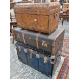 Three vintage cabin trunks.