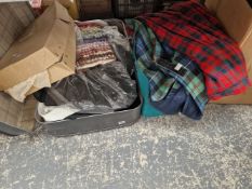 A large qty of vintage clothing including kilts etc.