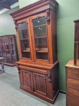 A Victorian mahogany bookcase cabinet.