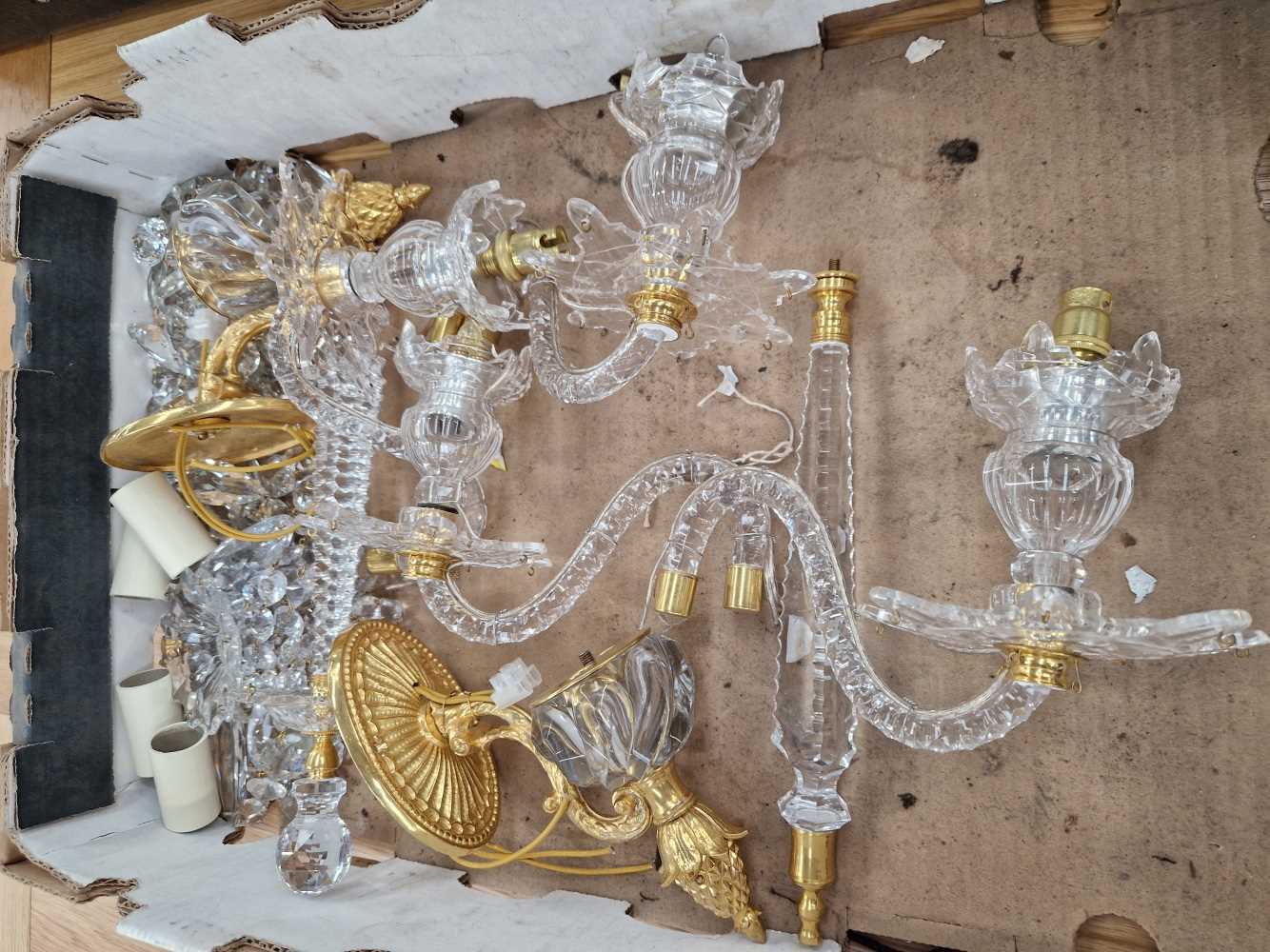 A pair of good quality cut glass two light wall sconces.