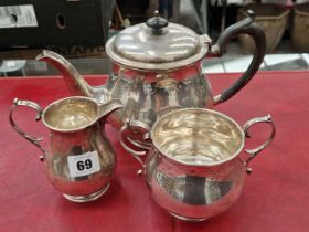 A hallmarked silver three piece tea-set.