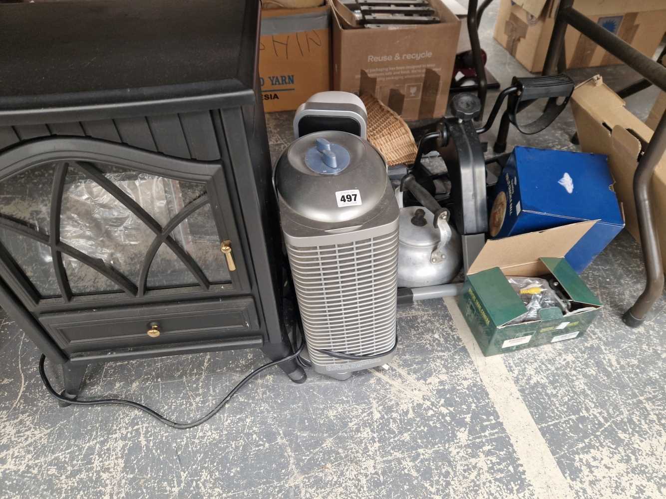 a modern electric heater, two fans, a tv bracket etc.