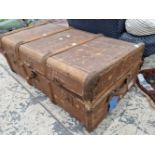 A vintage wood slat cabin trunk, a JVC turntable and a small t-square