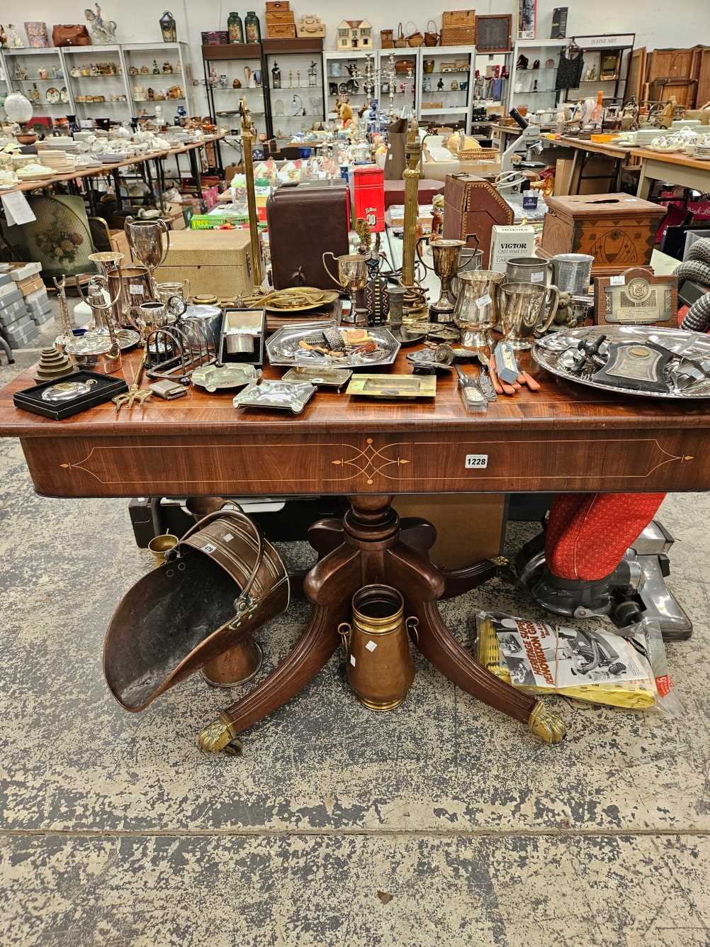 A Georgian mahogany side table on quadruped legs.