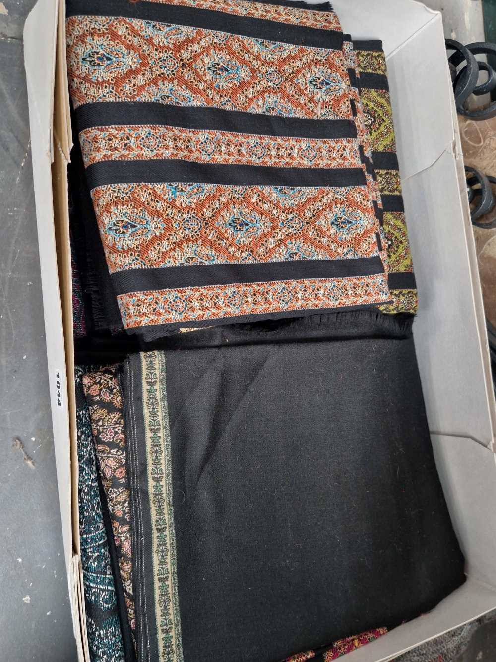 A large quantity of various Pashiminas/throws.