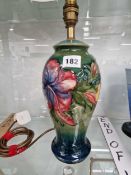 A Moorcroft hibiscus pattern baluster table lamp