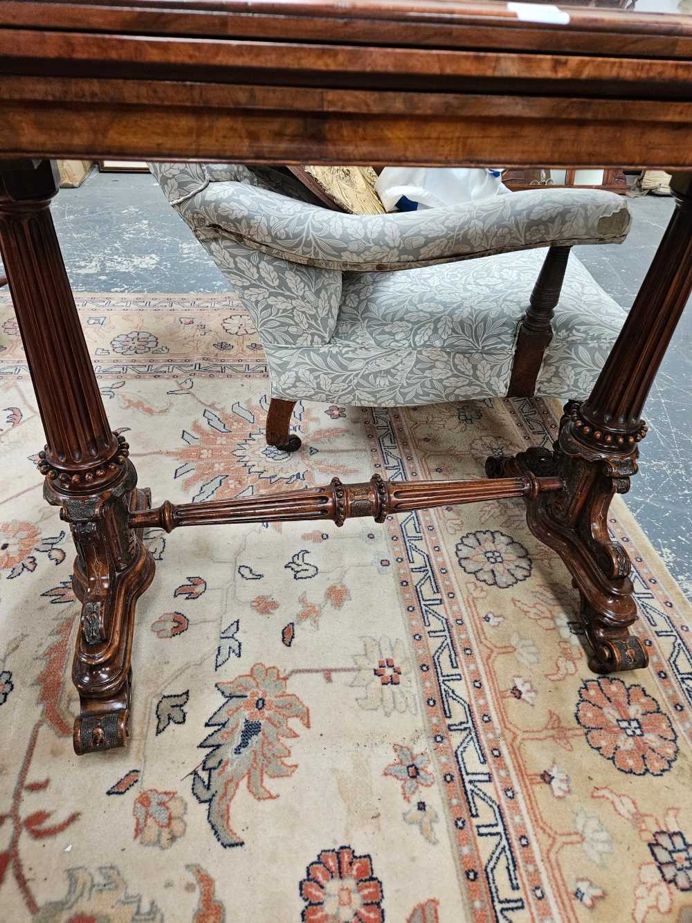 A Victorian burr walnut foldover games tables. - Image 2 of 5