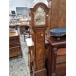 A Georgian style walnut cased Grandmother clock with three train movement.