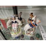 Four 19th C. Staffordshire pottery groups of figures and sheep