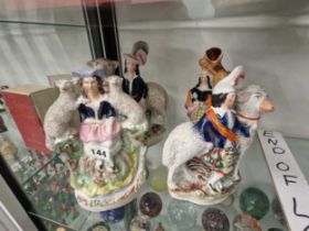 Four 19th C. Staffordshire pottery groups of figures and sheep