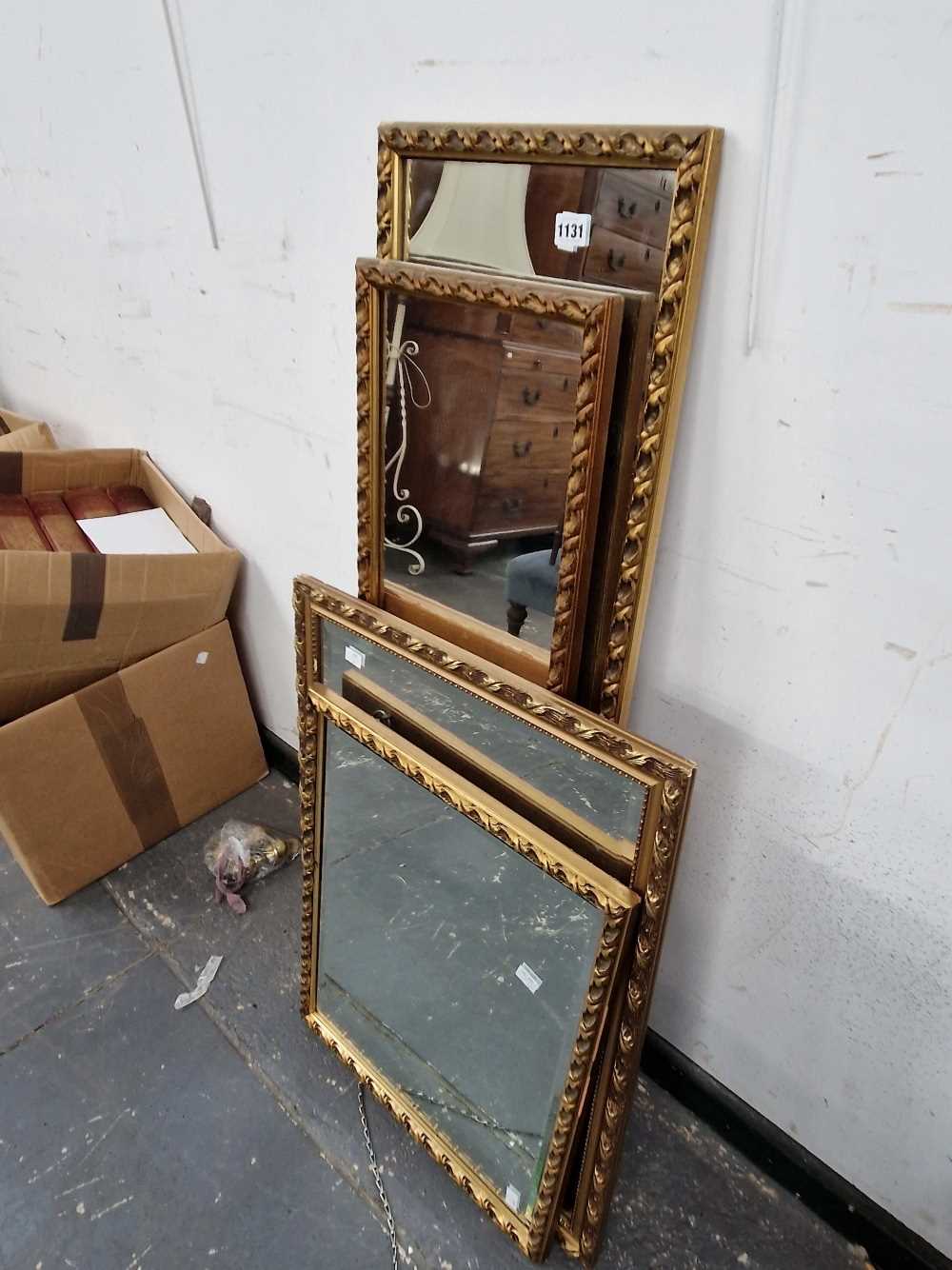 Four gilt framed mirrors