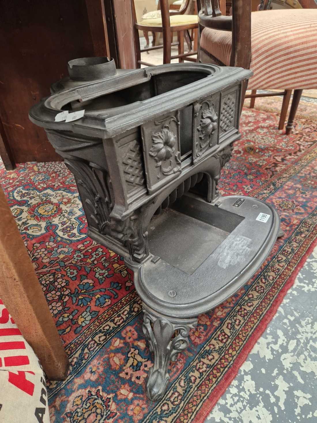 A small cast iron stove.