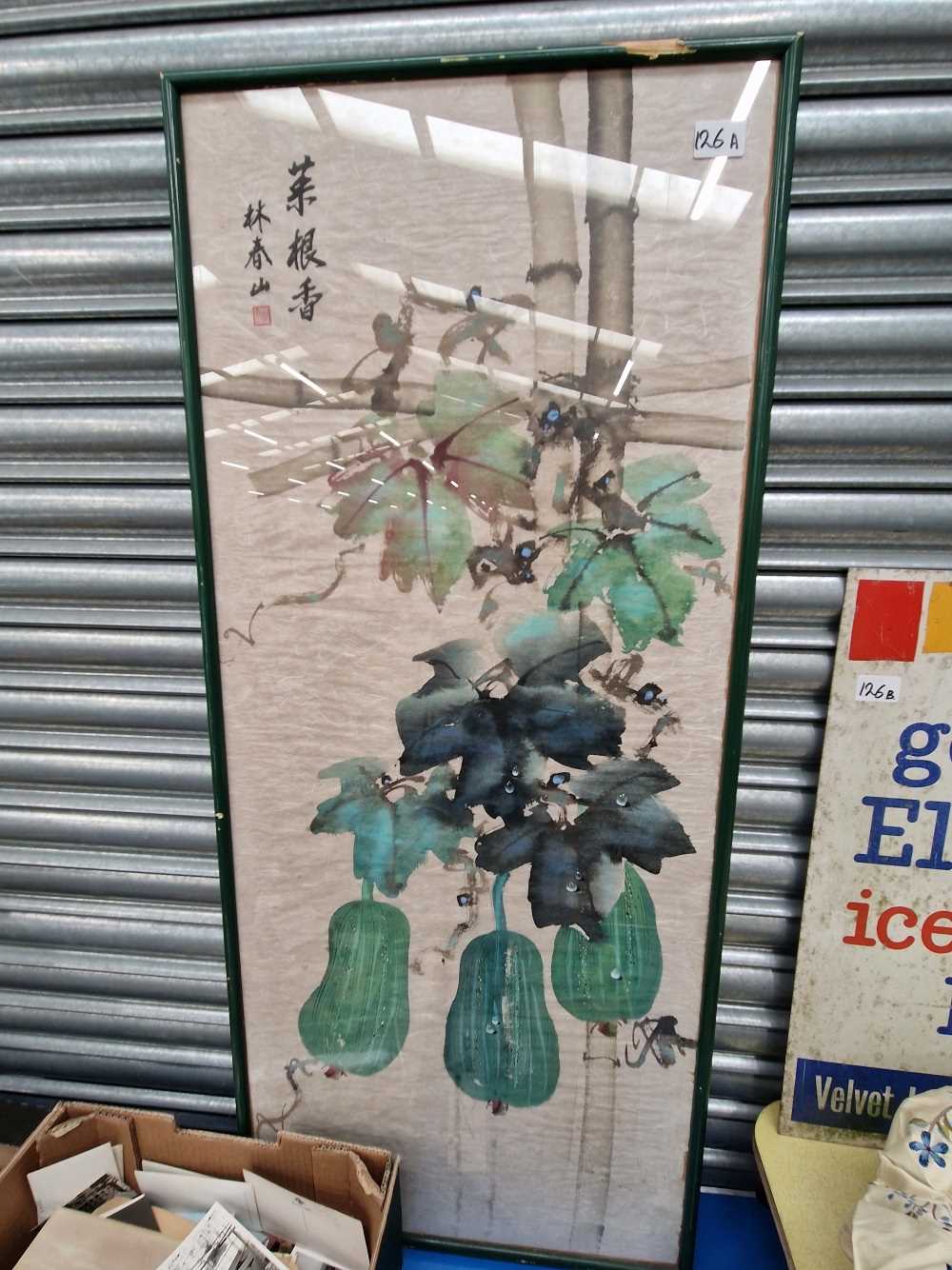 A large Oriental painted panel depicting fruiting vines.