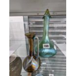 A Loetz type splashed iridescent glass bottle vase together with a ewer Good condition