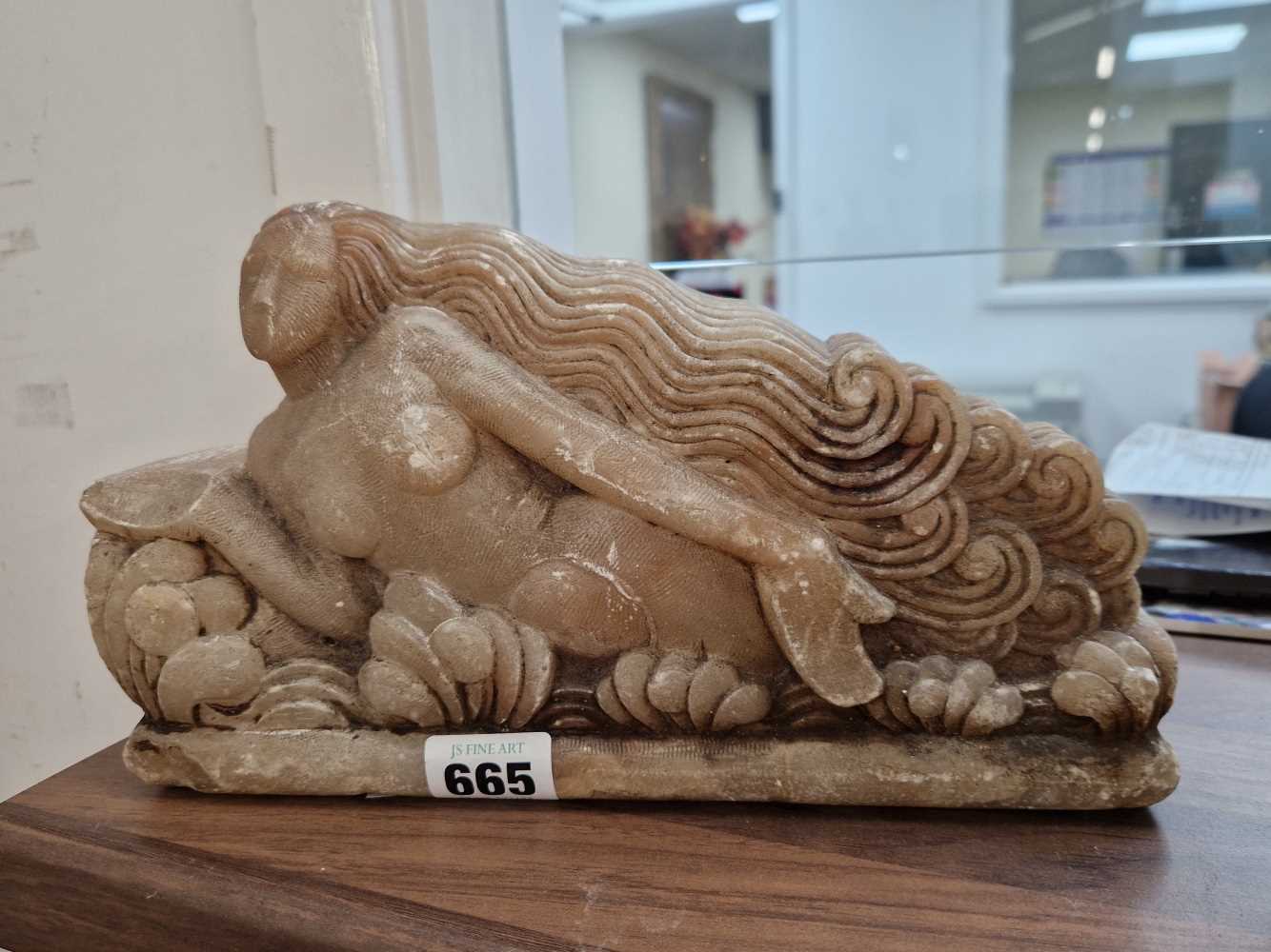 An Art Deco carved soapstone sculpture, Mermaid amidst the waves. This has bruises and abrasions and