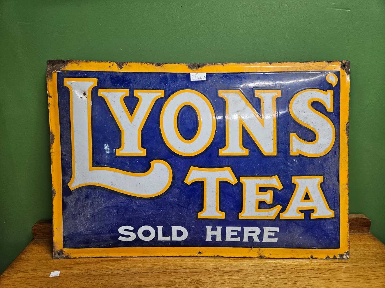 A vintage Lyons tea convex enamel sign 75cm x 50cm