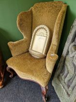 An antique high wingback arm chair. W 84 D 75 H 120 cmThe velvet damask upholstery is serviceable