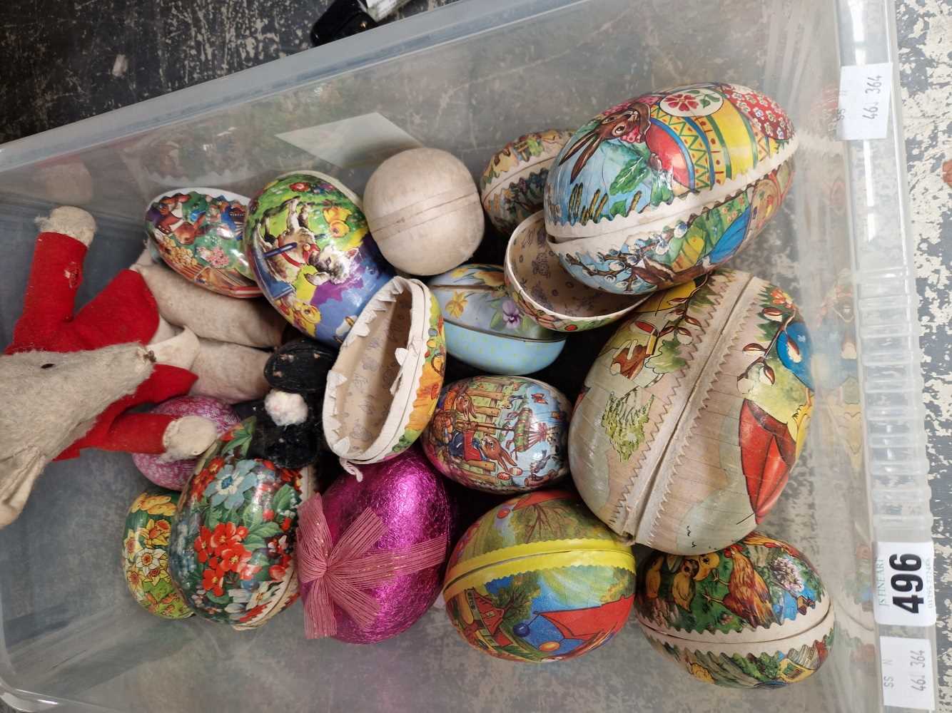 A box of Vintage decorated papier mache easter eggs.