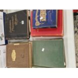 Eight stamp albums, each with some stamps