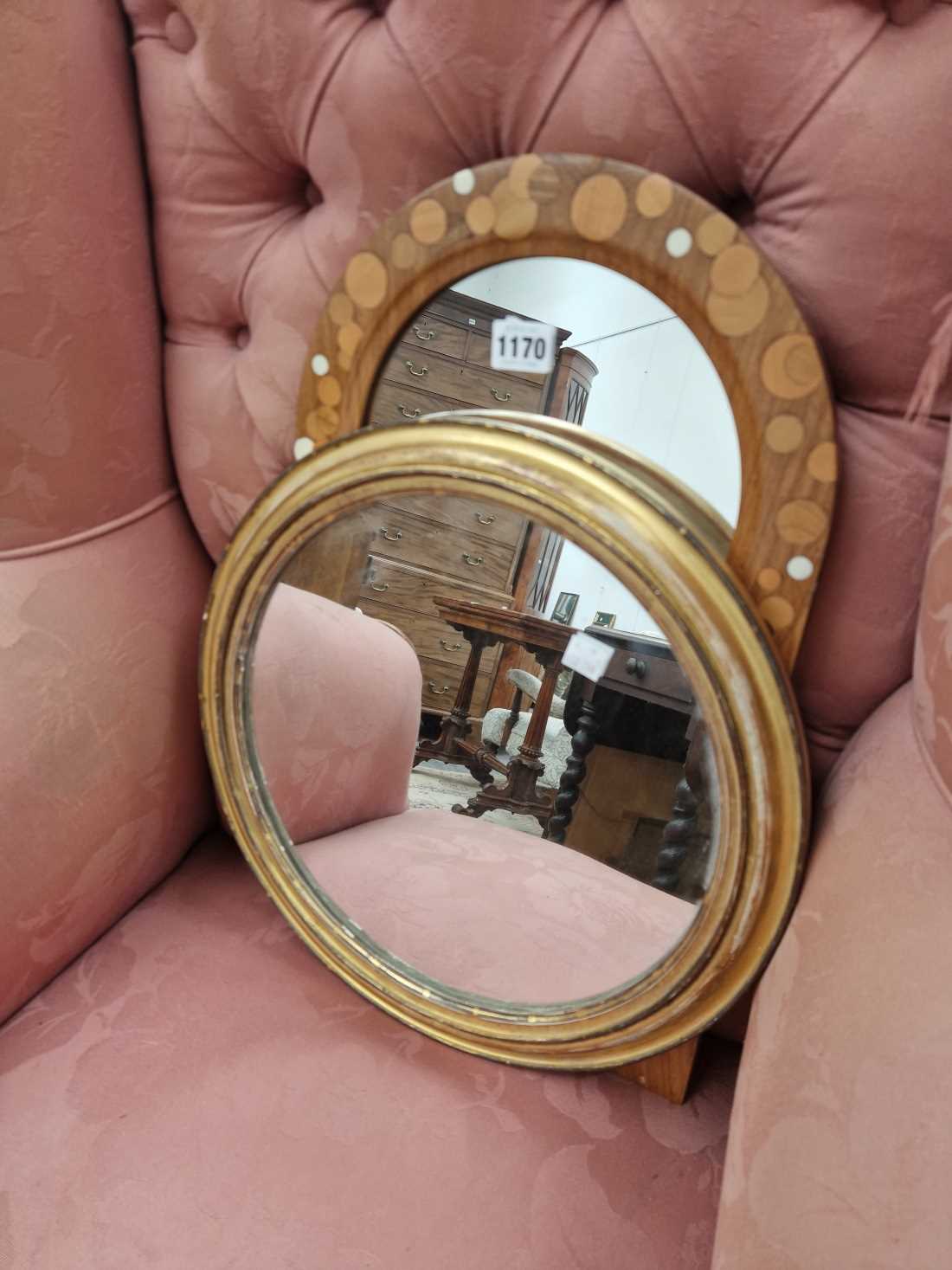 Two vintage wall mirrors.