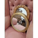 Two vintage wall mirrors.