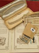 A string of costume pearls, various vinatge banknotes, cigarette cards etc.