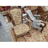 A French showframe armchair and a Victorian scroll armchair.