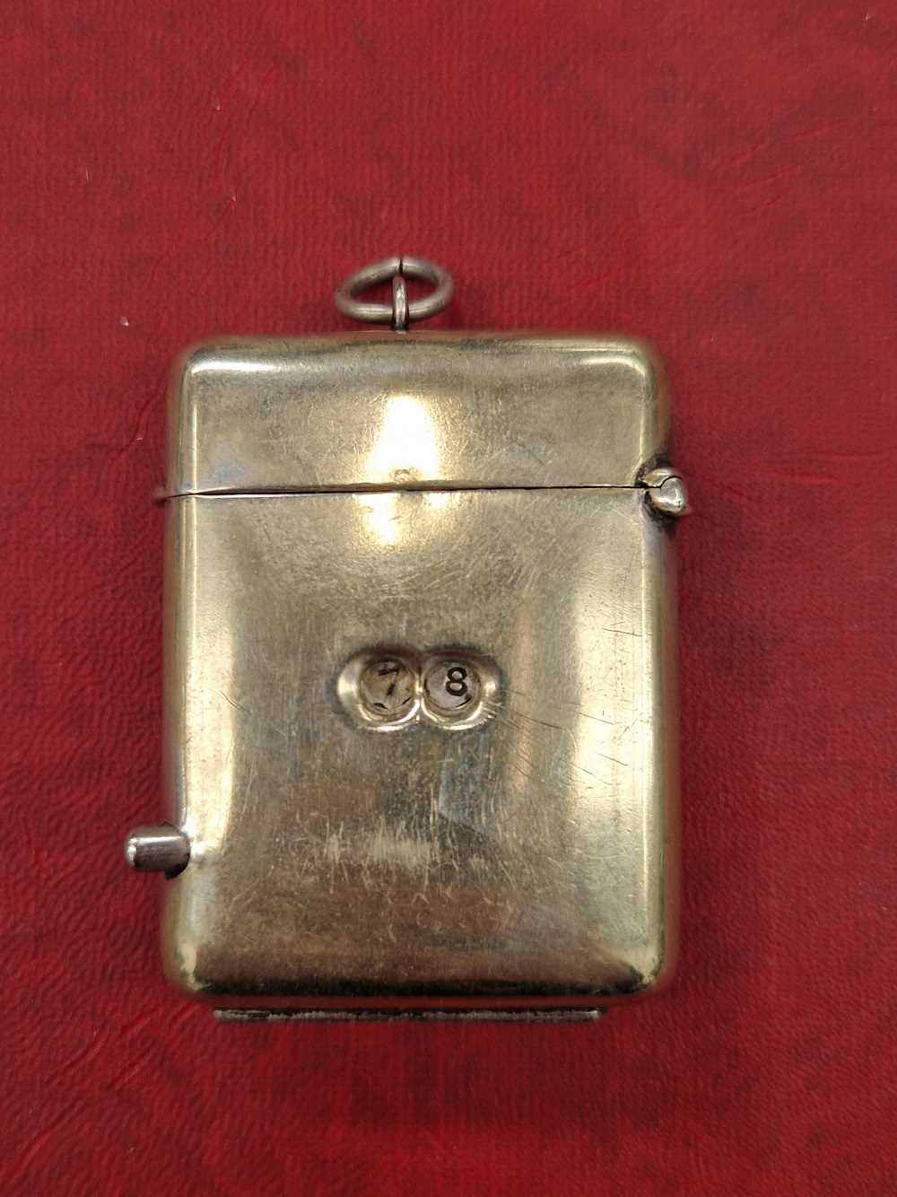 A nickle silver vesta case with rare push button game counter feature, inscribed for Royal Insurance