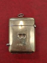 A nickle silver vesta case with rare push button game counter feature, inscribed for Royal Insurance