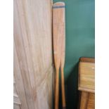 A pair of paddles/oars